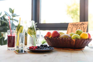 Assorted fresh fruits on a table, promoting natural detox and healthy living